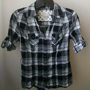 Cute plaid button down v-neck blouse.